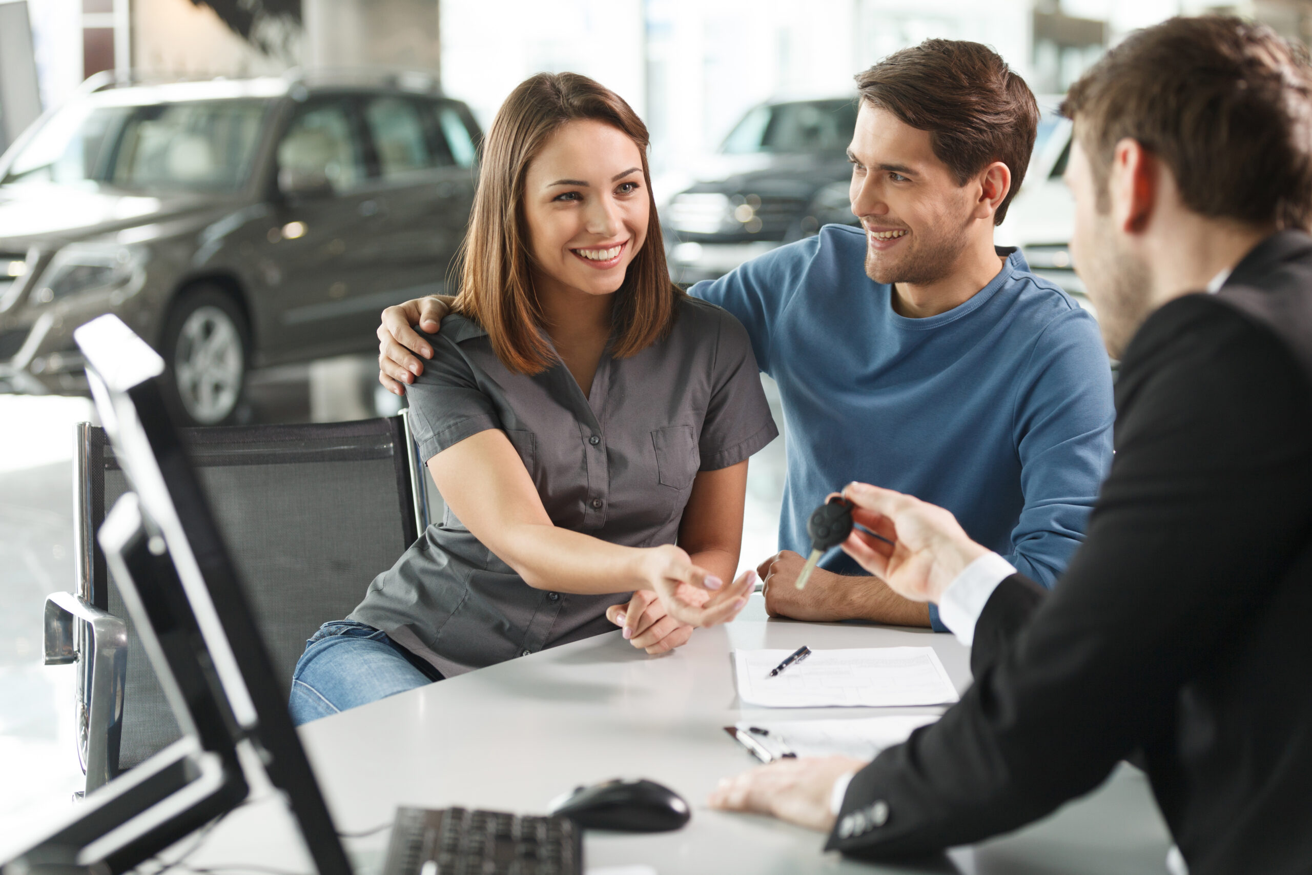Now,Her,Dream,Comes,True.,Car,Salesman,Giving,The,Key
